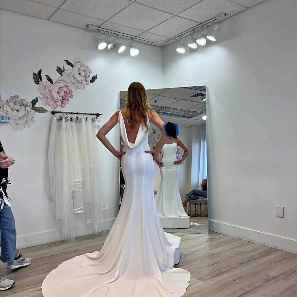 Elegant White Gown with Low Back
